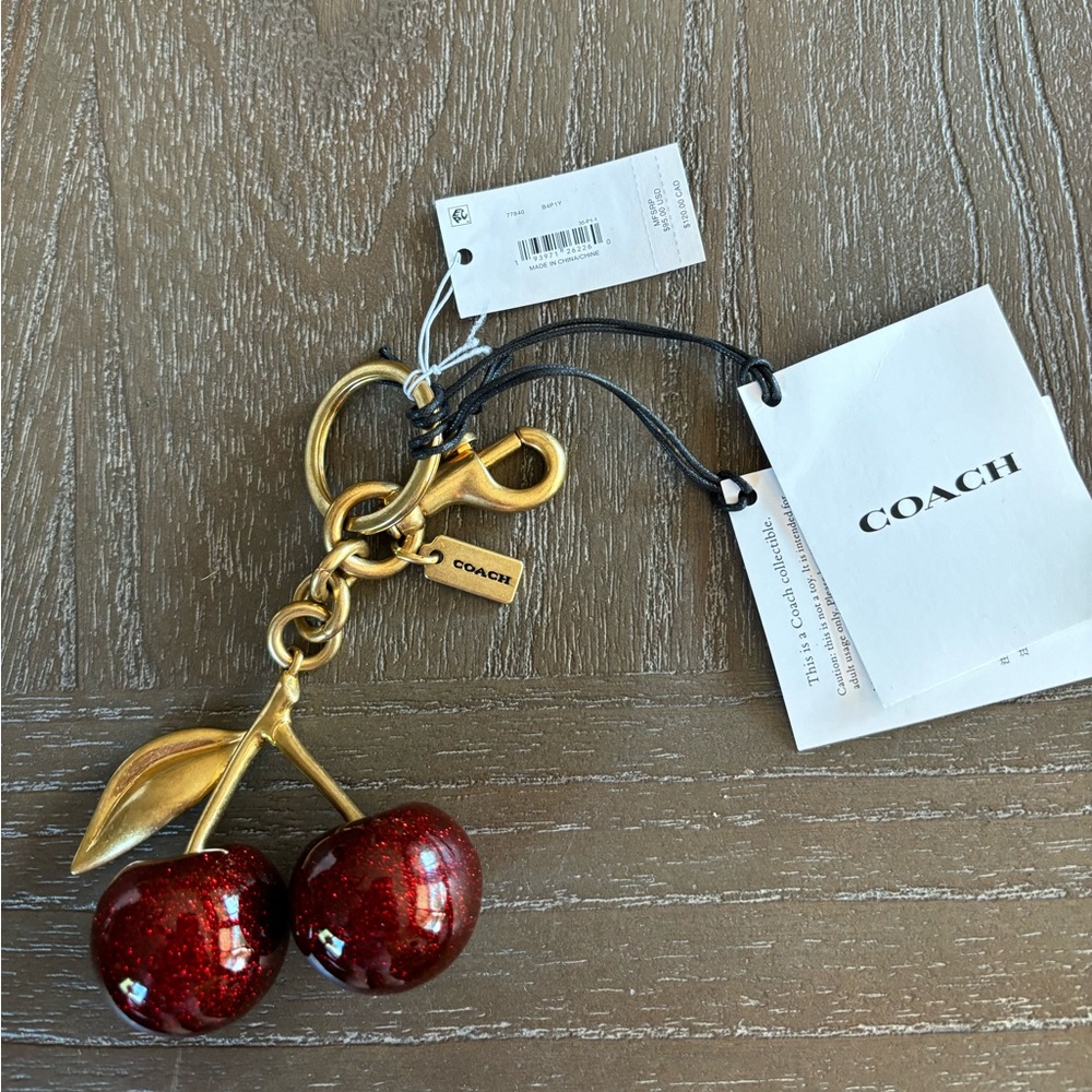COACH cherry charm/keychain.